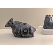 Lying bull with deposits, solar disc, sun symbol